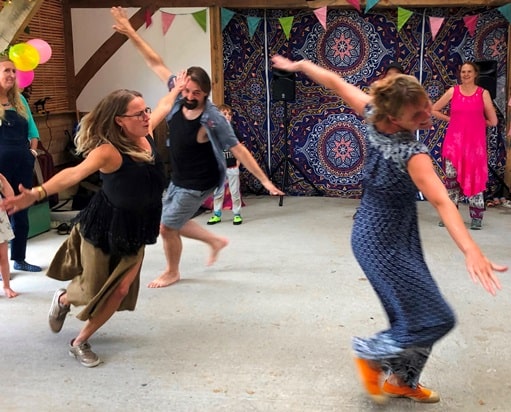 Joyful faces during a Biodanza class